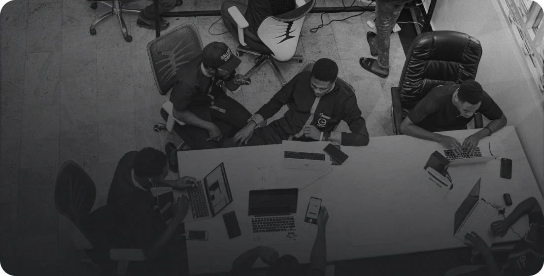 The Chigisoft team at work around a shared desk